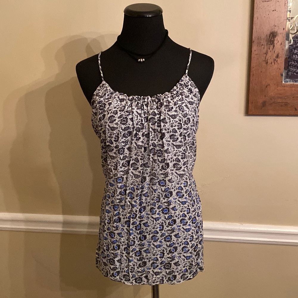 Floral Gap tank. Gathered at neckline and back. Blue details at the bottom.